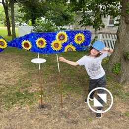 Blue whale with sunflowers, in honor of Ukraine